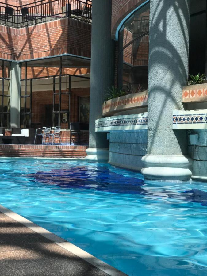 Casa Morales Hotel Internacional Y Centro De Convenciones اباغويه المظهر الخارجي الصورة The indoor pool at the hotel