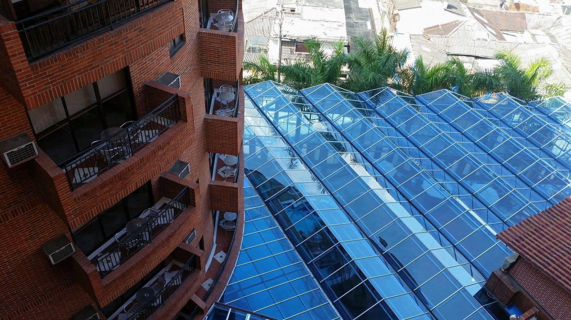 Casa Morales Hotel Internacional Y Centro De Convenciones اباغويه المظهر الخارجي الصورة Solar panels on the roof of the hotel